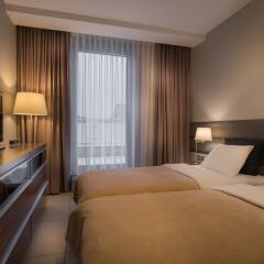 Отель Elite Apartments Galileo Польша, Познань - отзывы, цены и фото номеров - забронировать отель Elite Apartments Galileo онлайн комната для гостей фото 5