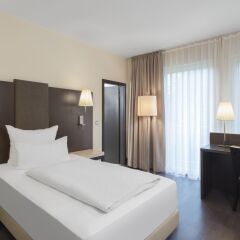 Отель NH Frankfurt Villa комната для гостей