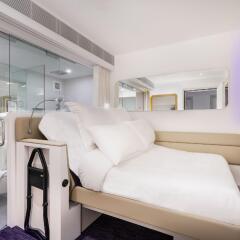 Отель Yotelair Singapore Changi Airport Сингапур комната для гостей