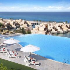 Отель The Cove Rotana Resort бассейн фото 5