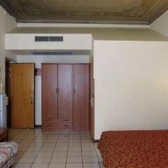 Отель Soana City Rooms сейф в номере