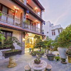 Отель Bonsai Homestay Хойан фото 14