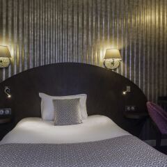 Отель Hôtel de Neuve Le Marais by Happyculture сейф в номере