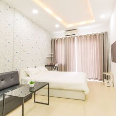Отель Qhome Saigon - Vo Van Tan комната для гостей