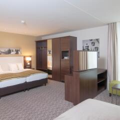 Отель Holiday Inn Munich-Unterhaching Германия, Унтерхахинг - 7 отзывов об отеле, цены и фото номеров - забронировать отель Holiday Inn Munich-Unterhaching онлайн комната для гостей фото 2
