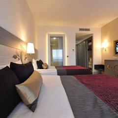 Отель Kirman Belazur Resort And Spa Богазкент комната для гостей фото 2