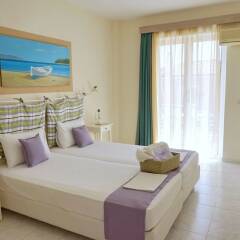 Отель Akrogiali Hotel Греция, Агистри - отзывы, цены и фото номеров - забронировать отель Akrogiali Hotel онлайн комната для гостей фото 5