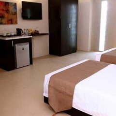 Отель Palm Rock Residences Филиппины, Макати - отзывы, цены и фото номеров - забронировать отель Palm Rock Residences онлайн комната для гостей фото 3