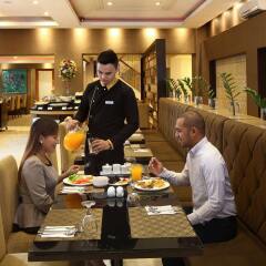 Отель City Garden Suites Manila Филиппины, Манила - 1 отзыв об отеле, цены и фото номеров - забронировать отель City Garden Suites Manila онлайн питание фото 2