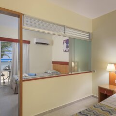 Avra Beach Resort Hotel & Bungalows - All Inclusive in Ialysos, Greece from 159$, photos, reviews - zenhotels.com guestroom