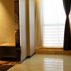 Dadongyu Hotel удобства в номере фото 2