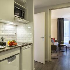 Отель Citadines Montmartre Paris в номере фото 2