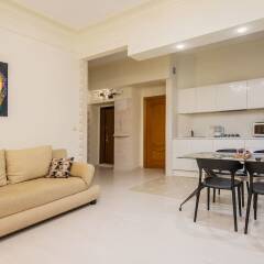Апартаменты GM Apartment Smolenskaya-Sennaya 27 Москва комната для гостей фото 4