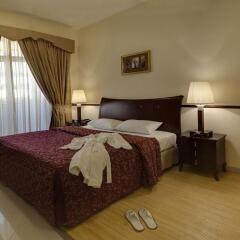 Отель Tulip Inn Al Qusais Dubai Suites Дубай комната для гостей