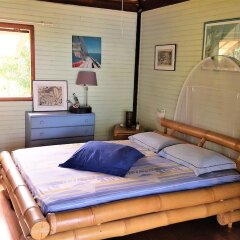 Отель Villa Arche de Noé Holiday home 3 Французская Полинезия, Муреа - отзывы, цены и фото номеров - забронировать отель Villa Arche de Noé Holiday home 3 онлайн комната для гостей фото 2