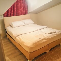 Отель Homelife Suites комната для гостей