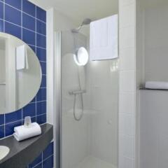 Отель B&B Hotel Braunschweig-Nord Германия, Брауншвейг - отзывы, цены и фото номеров - забронировать отель B&B Hotel Braunschweig-Nord онлайн ванная