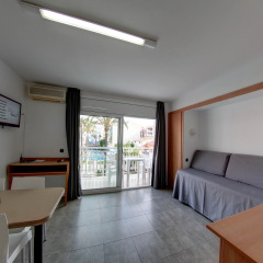 Отель Apartamentos Solimar Испания, Калафель - 4 отзыва об отеле, цены и фото номеров - забронировать отель Apartamentos Solimar онлайн комната для гостей фото 2
