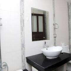 Отель Whispering Palms Suite ванная фото 2