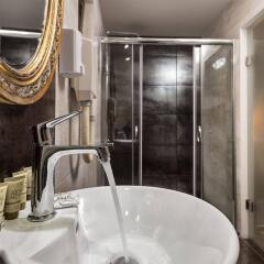 Elina Hotel Apartments ванная