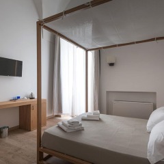 Отель Il Palazzotto Luxury Suites Лечче комната для гостей