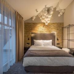 Отель Artagonist Art Hotel Литва, Вильнюс - 1 отзыв об отеле, цены и фото номеров - забронировать отель Artagonist Art Hotel онлайн комната для гостей фото 5