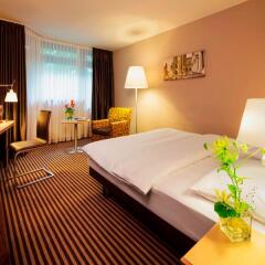 Mövenpick Hotel München-Airport комната для гостей фото 4