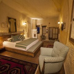 Отель Kayakapi Premium Caves Cappadocia комната для гостей фото 2