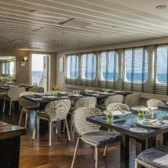 Отель Four Seasons Resort Maldives at Kuda Huraa