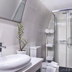 Отель Cosmopolitan Suites ванная