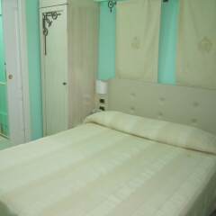 Palazzo Reginella Residence Hotel Бовалино-Марина сейф в номере