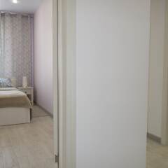 Апартаменты LUXKV Apartment on Nikoloyamskiy 3A комната для гостей фото 5
