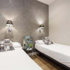Апартаменты AinB Eixample-Miro Apartments комната для гостей фото 3