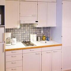 Апартаменты Kotimaailma Apartments Helsinki в номере