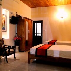 Отель Milk Fruit Homestay Хойан комната для гостей фото 4