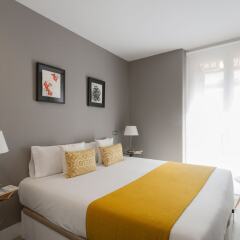 Отель Dobo Rooms Palacio Apartments Испания, Мадрид - отзывы, цены и фото номеров - забронировать отель Dobo Rooms Palacio Apartments онлайн комната для гостей