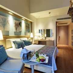 Отель Euphoria Aegean Resort & Spa All Inclusive Сыгаджик комната для гостей фото 5