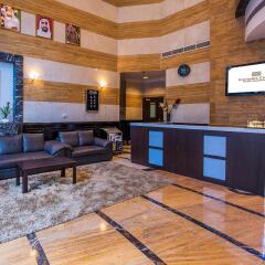 Emirates Grand Hotel Apartments интерьер отеля