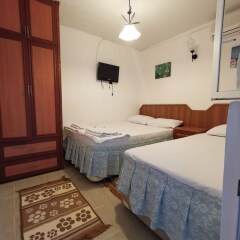 Отель Gulcan Pansiyon комната для гостей фото 5