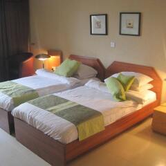 Отель Axari Hotel & Suites Нигерия, Калабар - отзывы, цены и фото номеров - забронировать отель Axari Hotel & Suites онлайн комната для гостей фото 4
