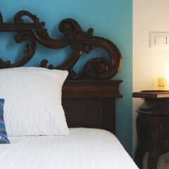Отель Laxmi Guesthouse B&B Италия, Генуя - отзывы, цены и фото номеров - забронировать отель Laxmi Guesthouse B&B онлайн комната для гостей фото 3