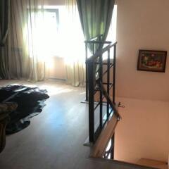Гостиница Guest House Kalinina Street 133 в Ейске отзывы, цены и фото номеров - забронировать гостиницу Guest House Kalinina Street 133 онлайн Ейск комната для гостей фото 5