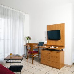 Отель Séjours & Affaires Park Avenue Франция, Лион - отзывы, цены и фото номеров - забронировать отель Séjours & Affaires Park Avenue онлайн удобства в номере
