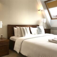 Отель Vilnius Apartments & Suites - Town Hall Литва, Вильнюс - отзывы, цены и фото номеров - забронировать отель Vilnius Apartments & Suites - Town Hall онлайн комната для гостей фото 2