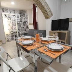 Апартаменты Santi Quattro Apartment & Rooms - Colosseo в номере