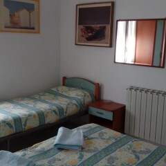 Отель Taormina B&B Римини сейф в номере