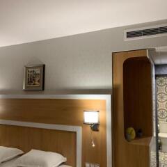 TM Deluxe Hotel комната для гостей фото 6