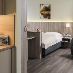 Отель SVG Boardinghaus Германия, Мюнхен - отзывы, цены и фото номеров - забронировать отель SVG Boardinghaus онлайн удобства в номере фото 2