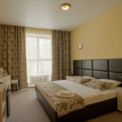 Гостиница Мартон Ошарская в Нижнем Новгороде 7 отзывов об отеле, цены и фото номеров - забронировать гостиницу Мартон Ошарская онлайн Нижний Новгород комната для гостей фото 2