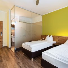 Отель Basic Hotel Innsbruck Австрия, Инсбрук - 1 отзыв об отеле, цены и фото номеров - забронировать отель Basic Hotel Innsbruck онлайн комната для гостей фото 2